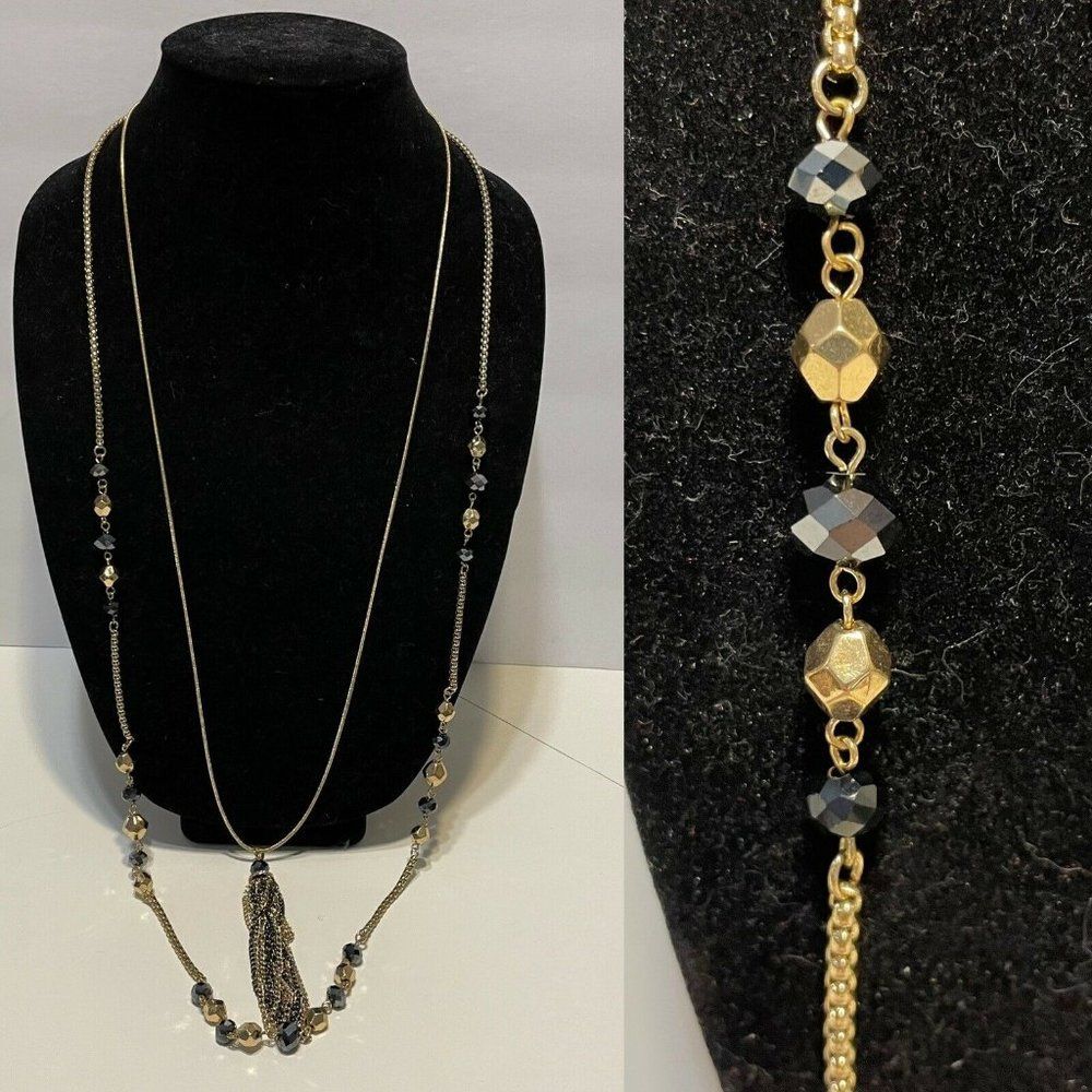 Long Gold tone Black Multi Faceted Bead Multi